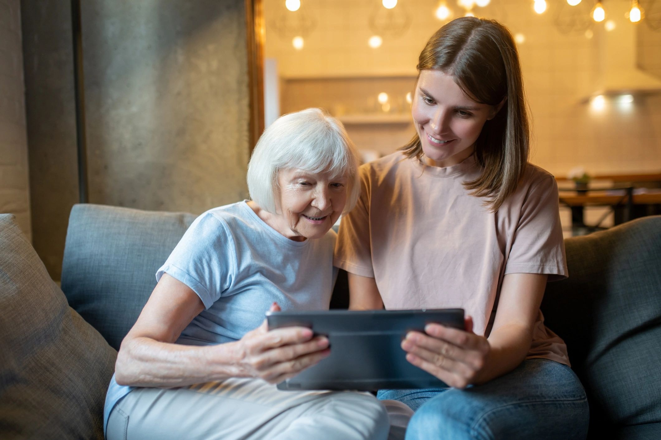 Carer with elderly woman outdoors